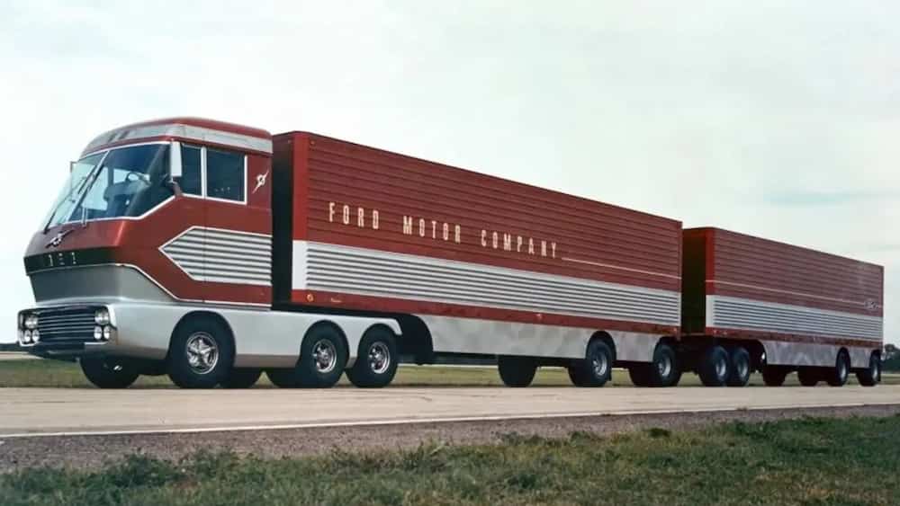 The Ford Big Red — 600 hp gas turbine semi-truck — exhibited at the New York World's Fair alongside the Ford Mustang, August 1964